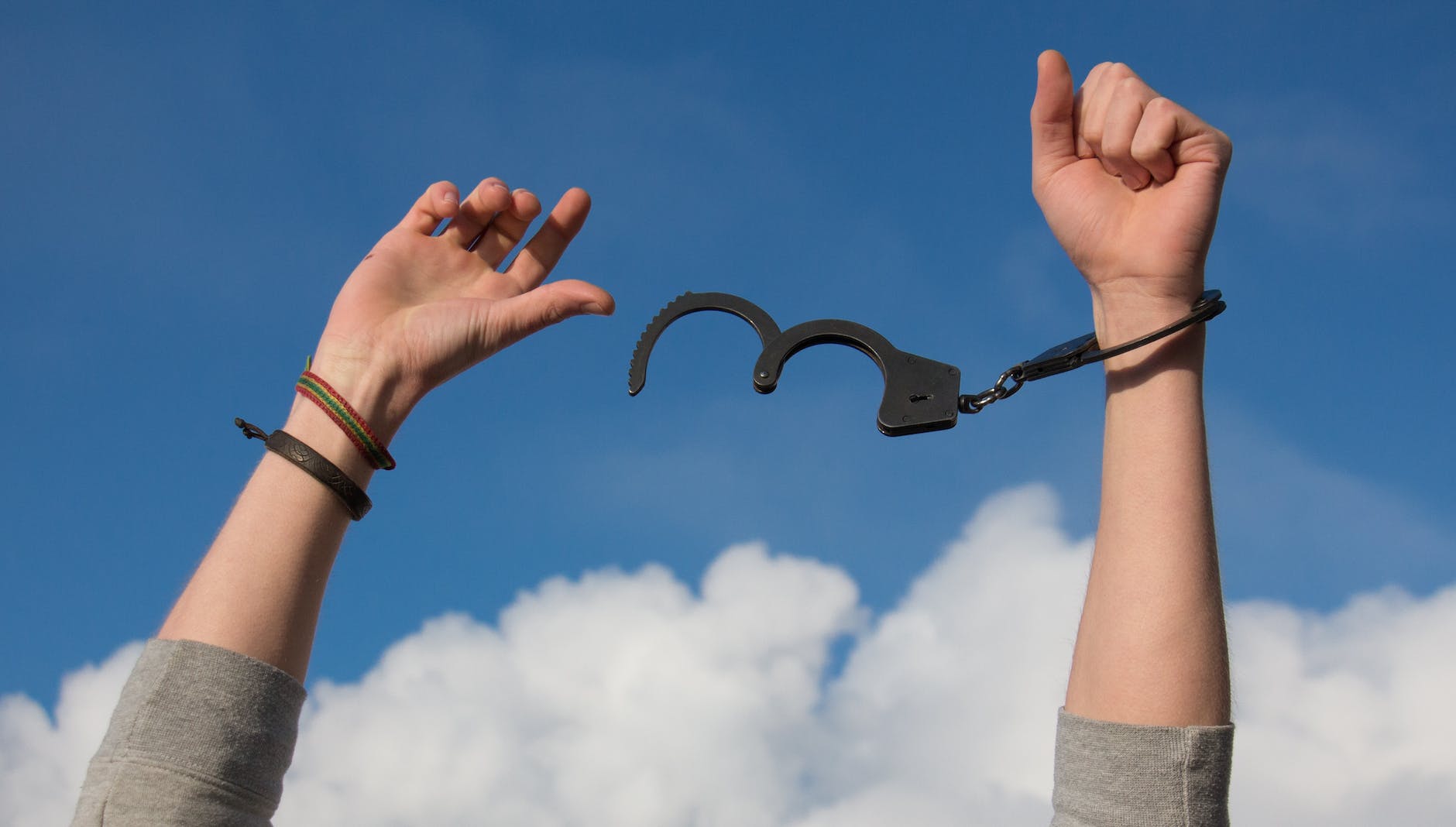 break-free-of-addiction-hands-breaking-free-of-handcuffs